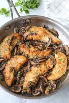 Chicken and Mushrooms in a Garlic White Wine Sauce - 30 Best Garlic Chicken Recipes That You Never Forget