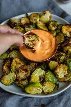 Crispy Sesame Brussels Sprouts Sriracha Aioli - 30 Best Easy And Delicious Brussels Sprouts Recipes For Your Meals