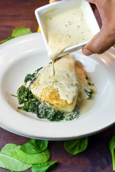 Foil Baked Chilean Sea Bass with Lemon Parmesan Cream Sauce - Crazy Good Fish Recipes