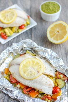 Grilled Foil Packet Tilapia with Pesto Veggies - Collection Of The Best Delicious Tilapia Recipes