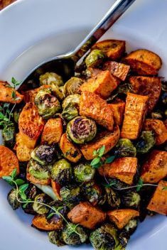 Roasted Sweet Potatoes and Brussels Sprouts - 30 Best Easy And Delicious Brussels Sprouts Recipes For Your Meals