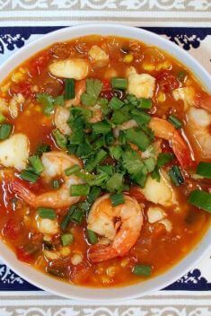 Spicy Tomato Seafood and Chorizo Stew - 30 Best Delicious Seafood Soup Recipes To Brighten Your Dinner
